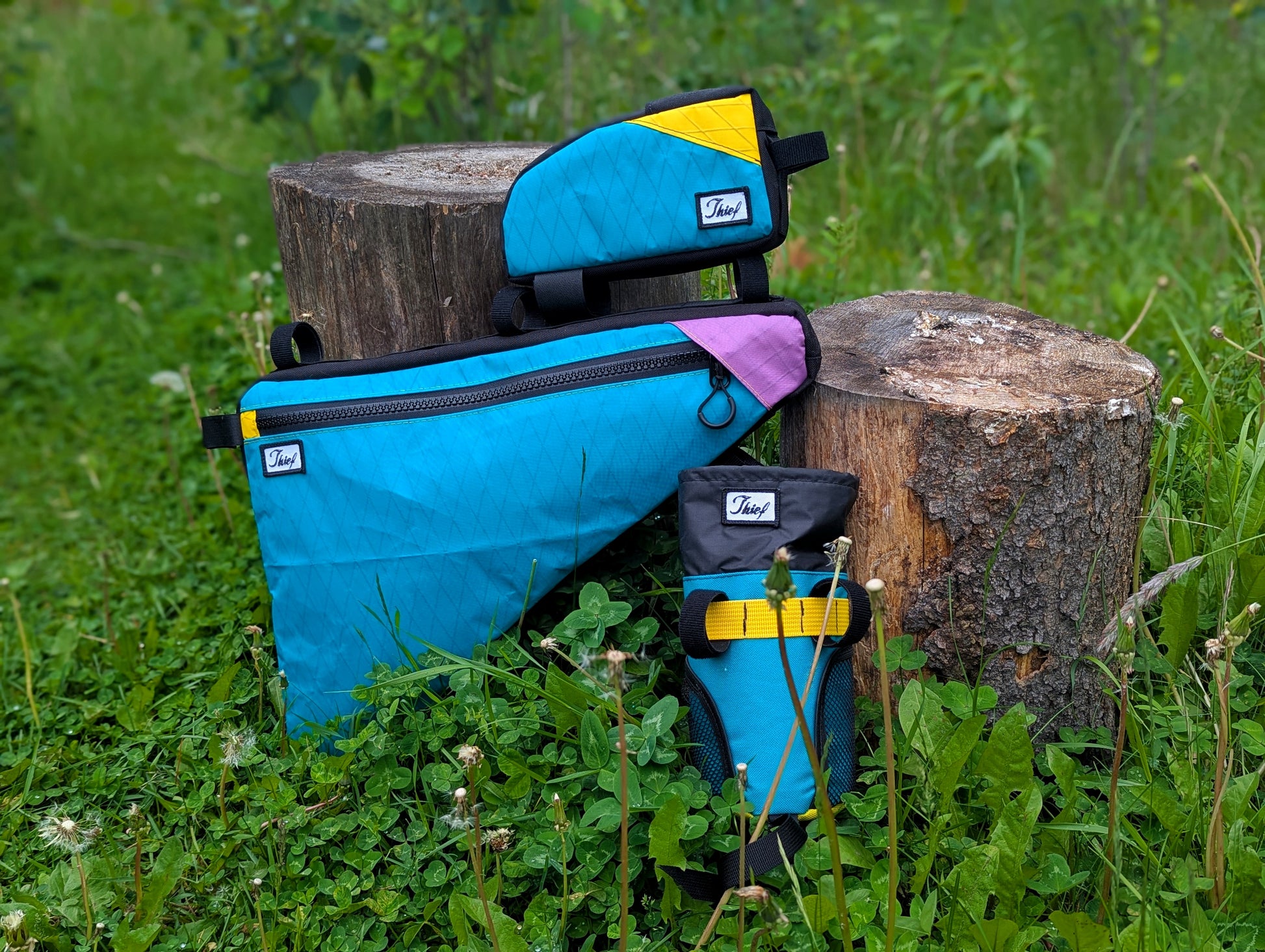 Blue bag with colorful accents on a grassy background