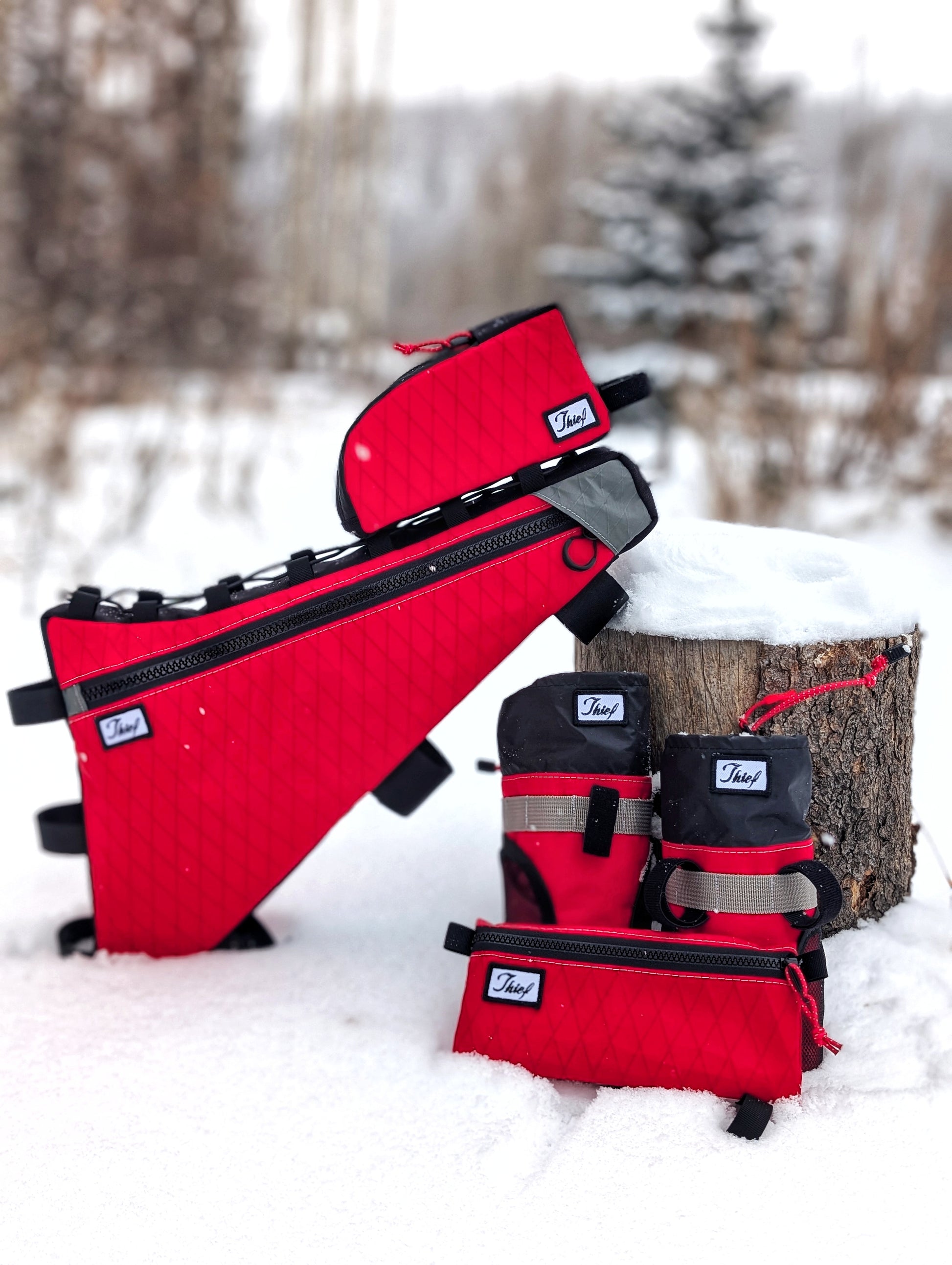 Red and black bags on a snowy background